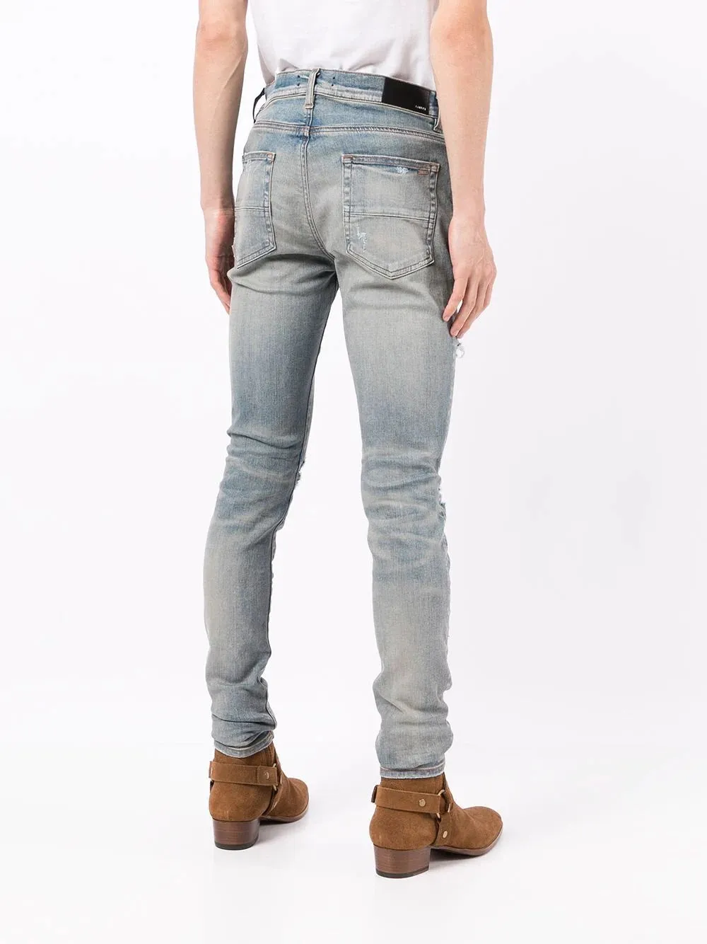 AMIRI DISTRESSED SKINNY JEANS